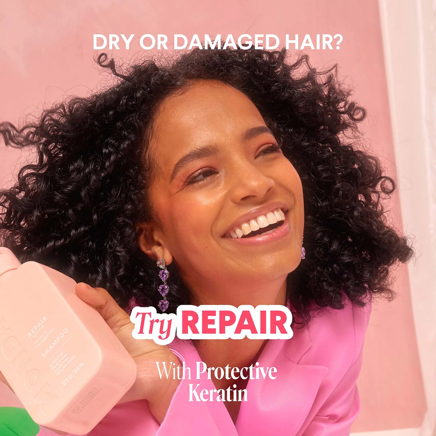 MONDAY Haircare Repair Shampoo and Conditioner set promotional image with text young black women smiling showcasing her curly black hair.