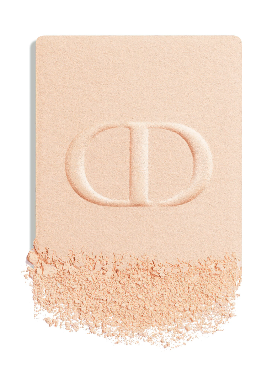 Compact foundation by Dior color swatch on a white background.