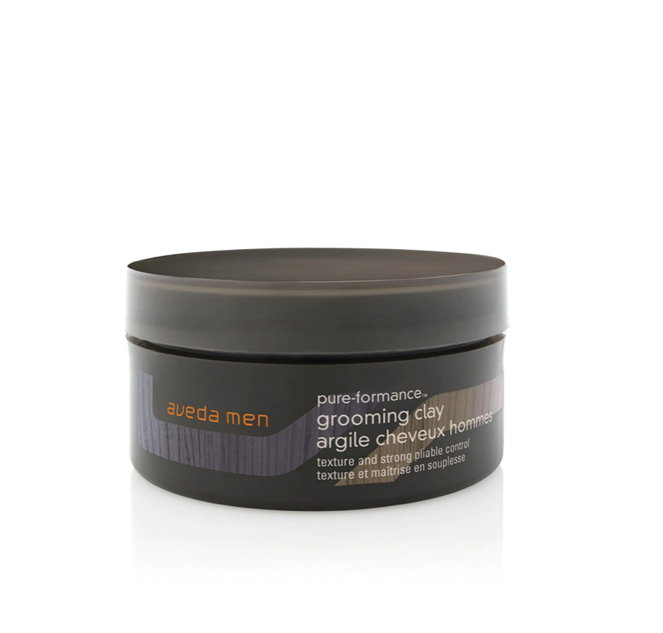 Aveda Men's grooming clay jar on a white background