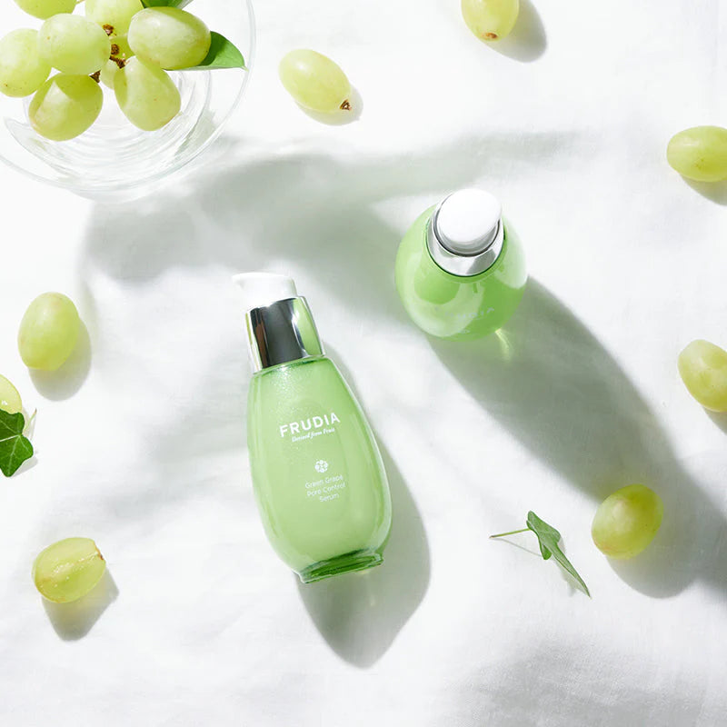 FRUDIA Green Grape Serum 50g styled with natural elements to reflect pore care, balance and lightweight hydration