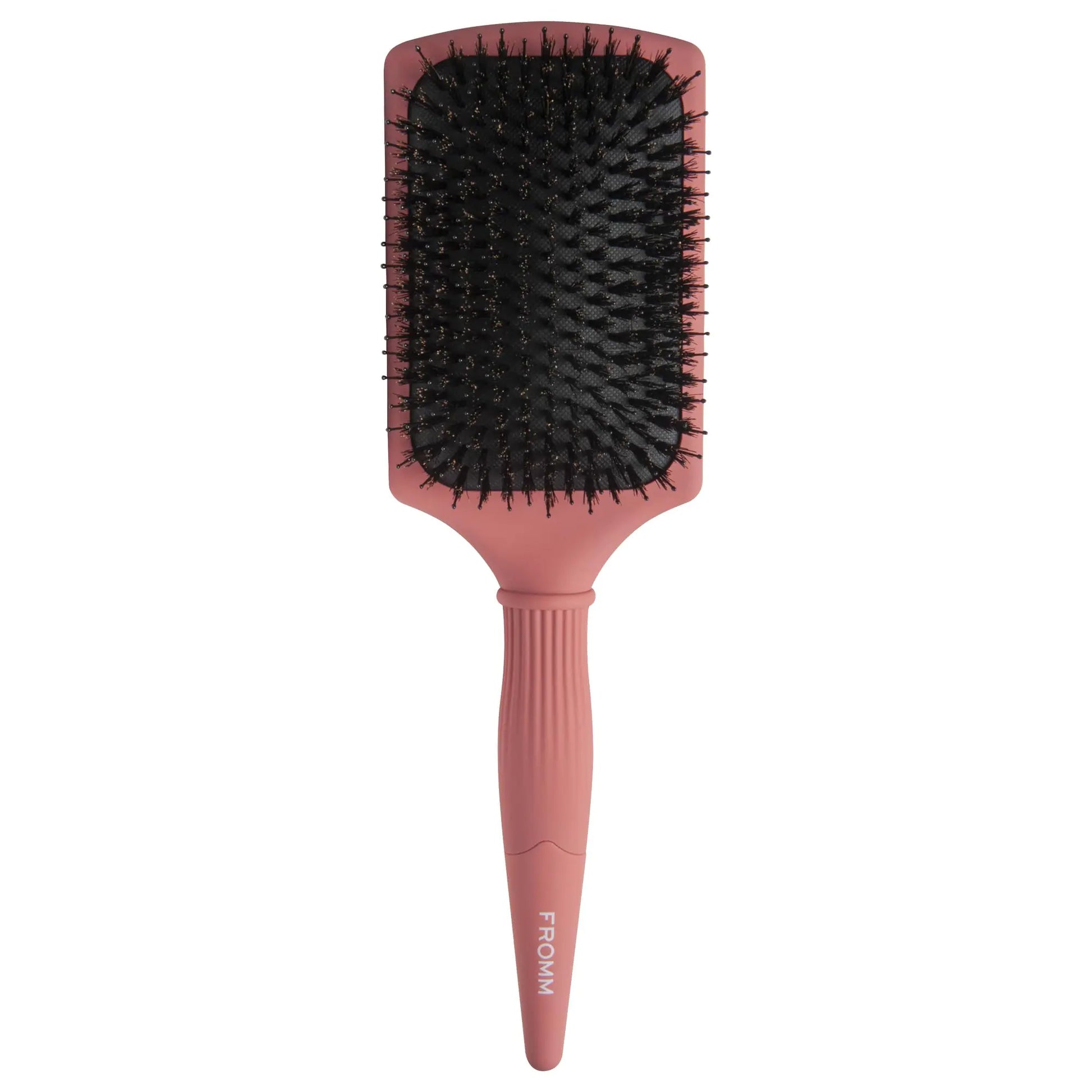 Fromm Pink paddle hair brush with black bristles on a white background