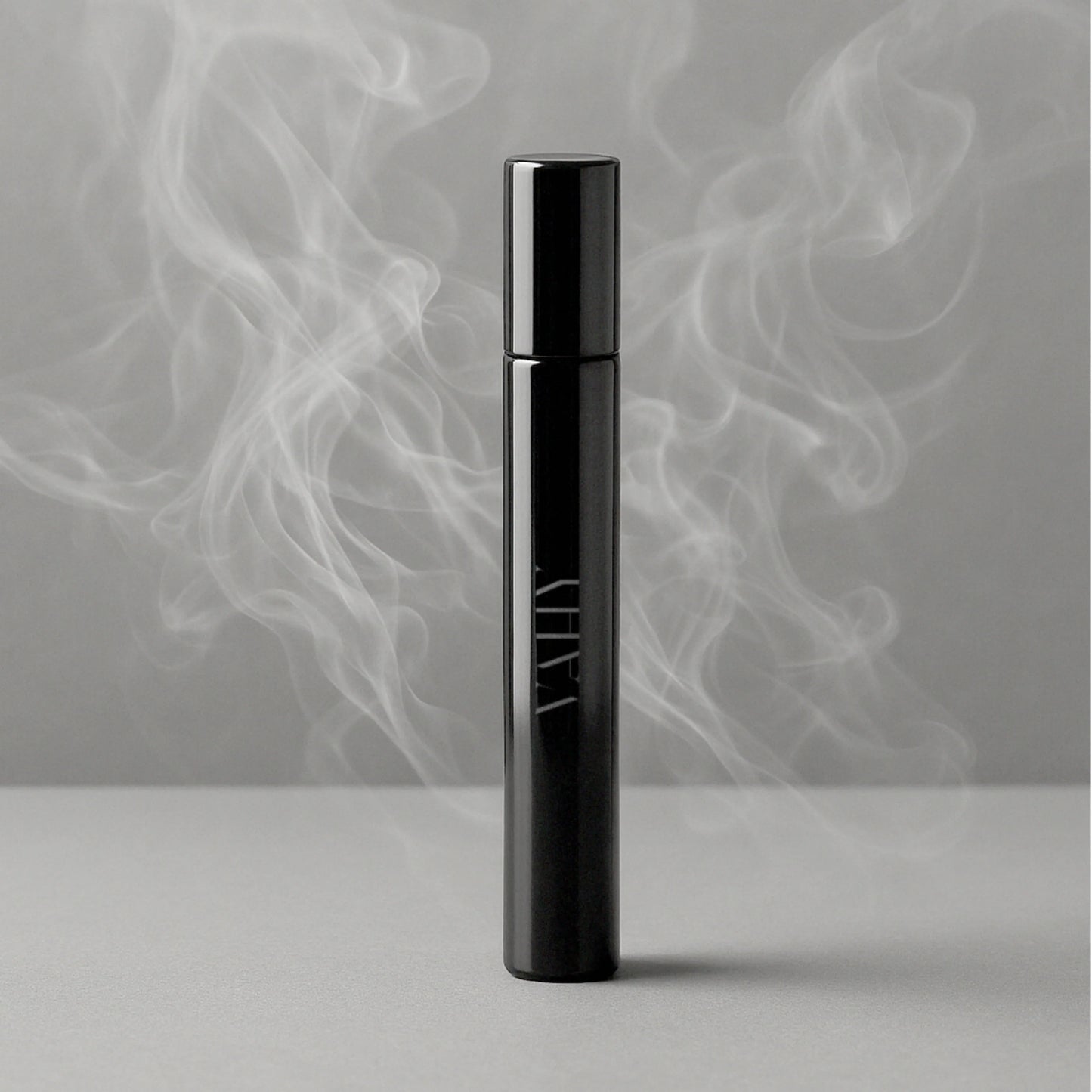 VAHY Ember Haze Natural Perfume 10ml with rich amber warmth, shadowed depth and a softly diffused smoky finish