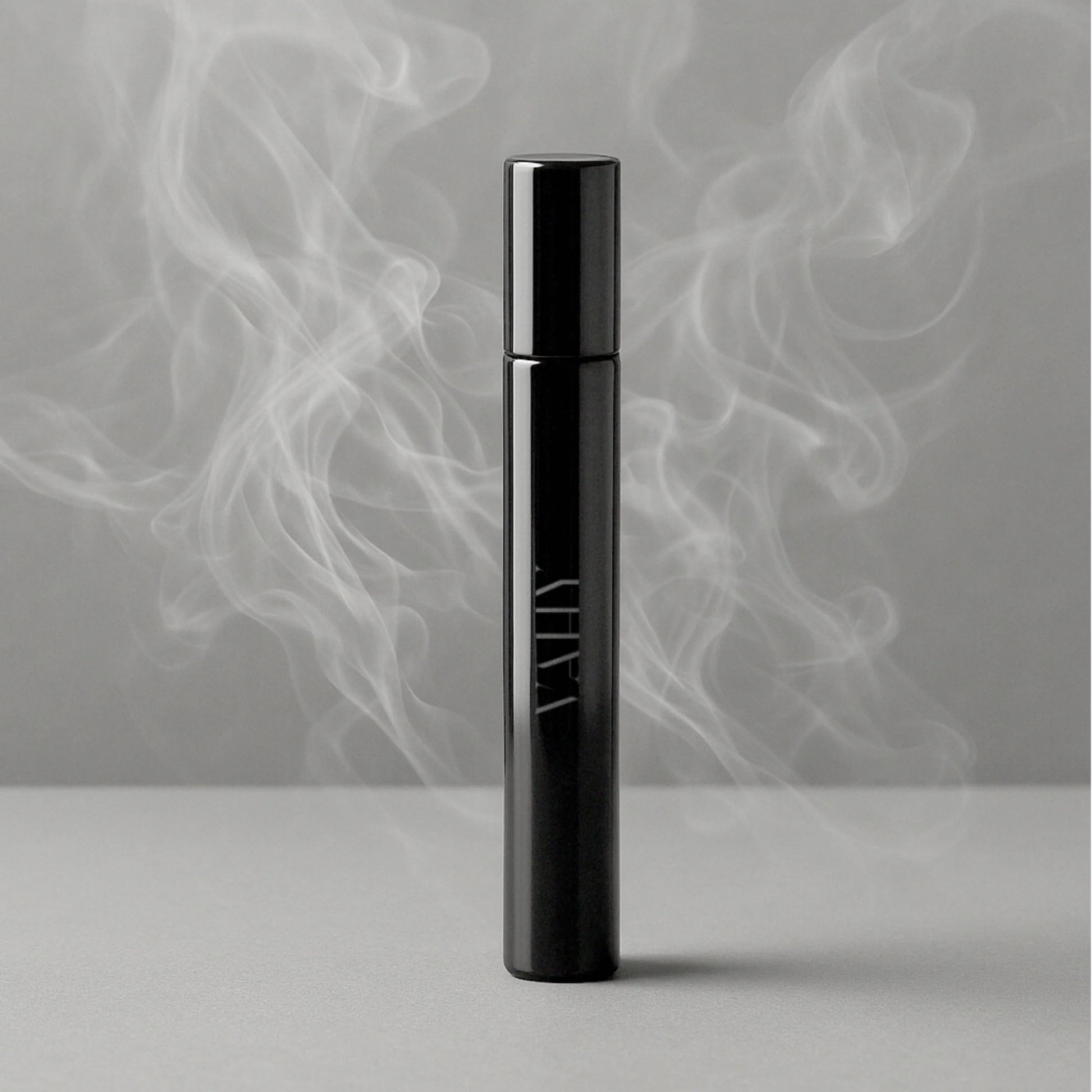 VAHY Ember Haze Natural Perfume 10ml with rich amber warmth, shadowed depth and a softly diffused smoky finish