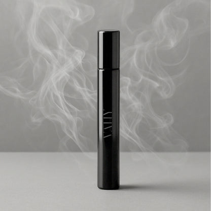 VAHY Ember Haze Natural Perfume 10ml with rich amber warmth, shadowed depth and a softly diffused smoky finish