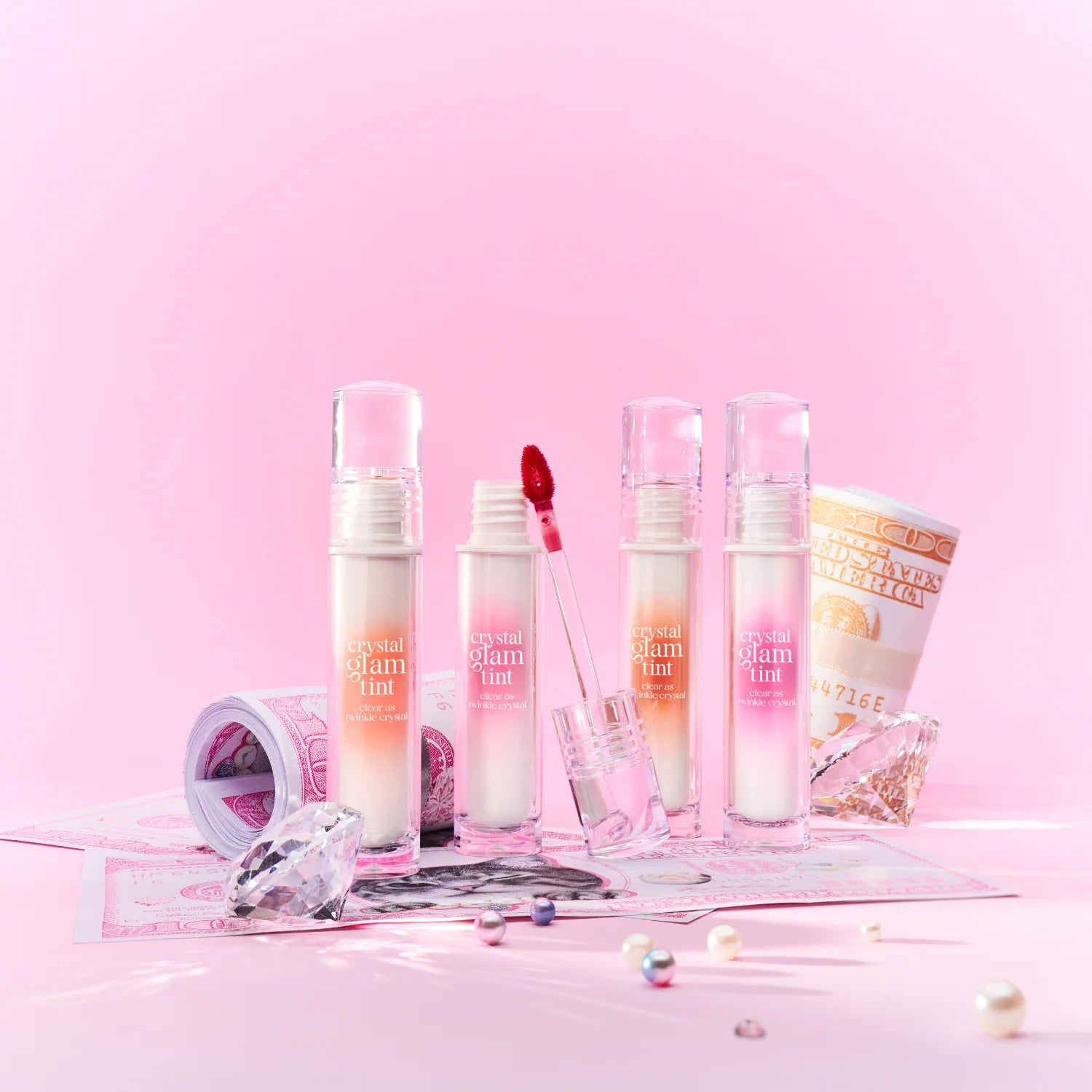 CLIO Crystal Glam Tint 3.4g texture showing high shine gloss and smooth lightweight application