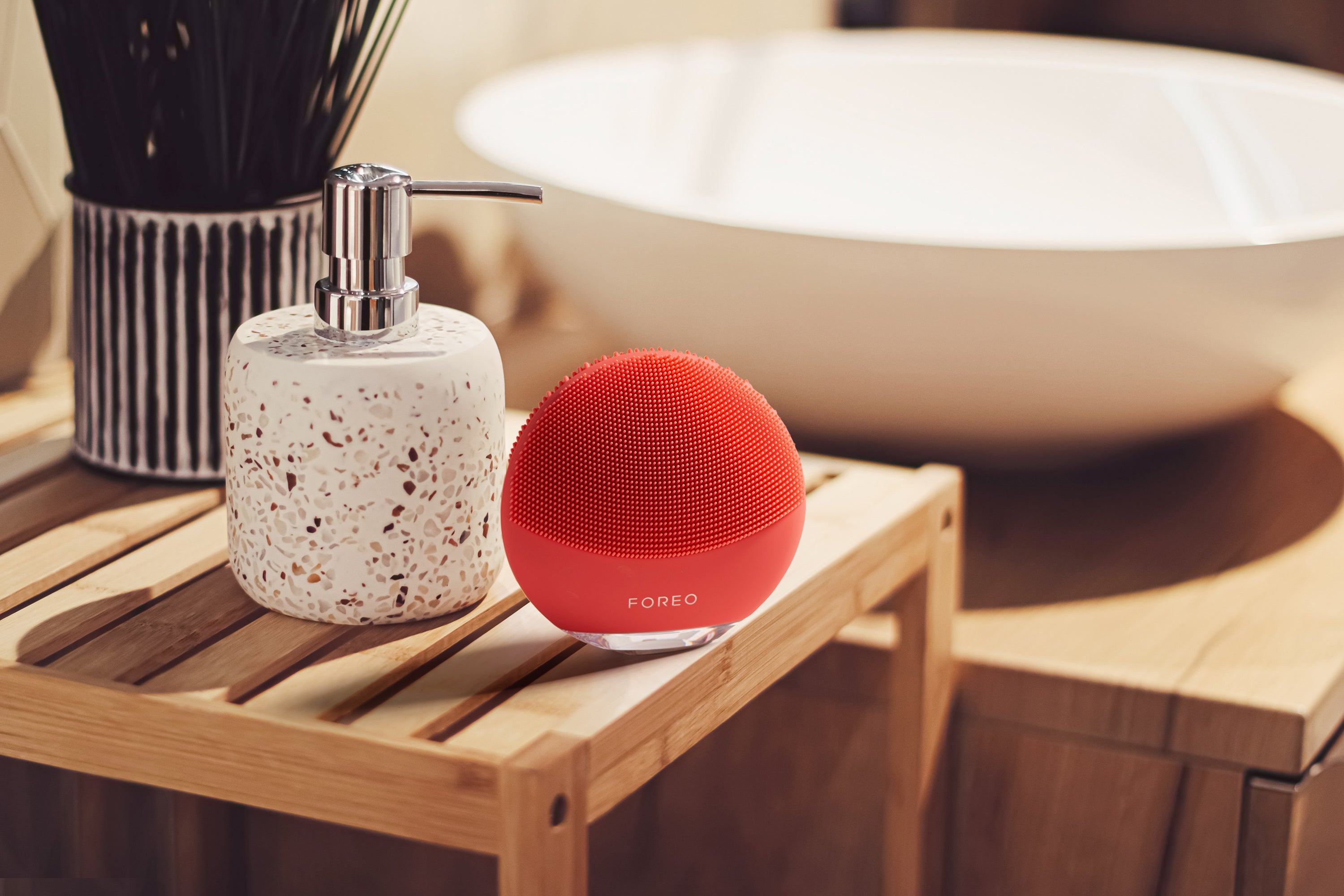 FOREO LUNA™ 4 mini facial cleansing device for gentle daily cleansing - coral