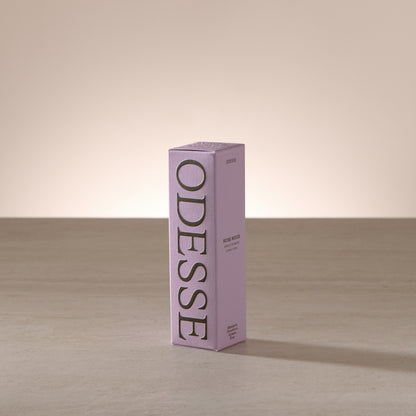 Odesse Rose Wood 10ml extrait de parfum displayed in a soft, light-filled setting with a refined, portable format
