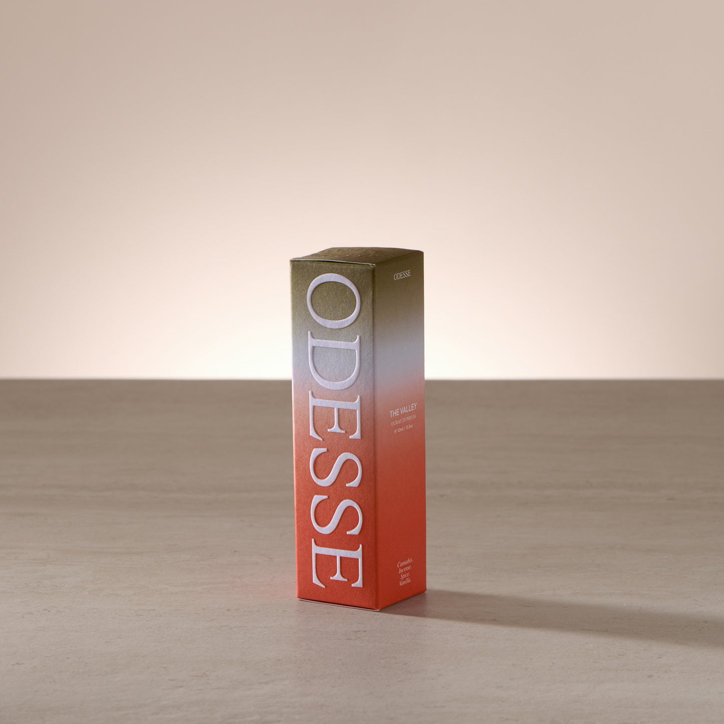 Odesse The Valley 10ml extrait de parfum displayed in a clean, light-filled setting with a focus on compact luxury
