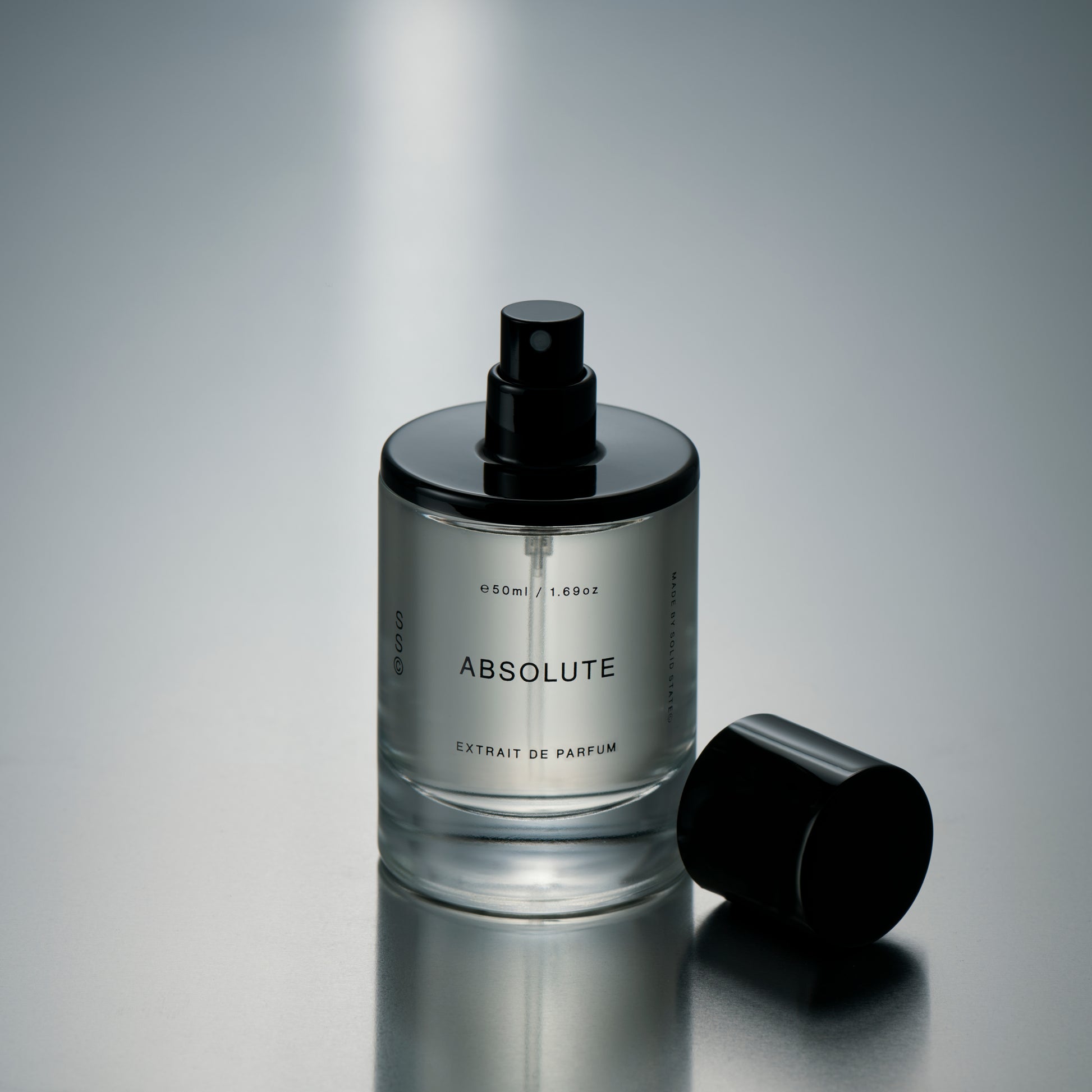 Solid State Absolute Extrait de Parfum delivering a smooth, grounded scent with a refined, modern character