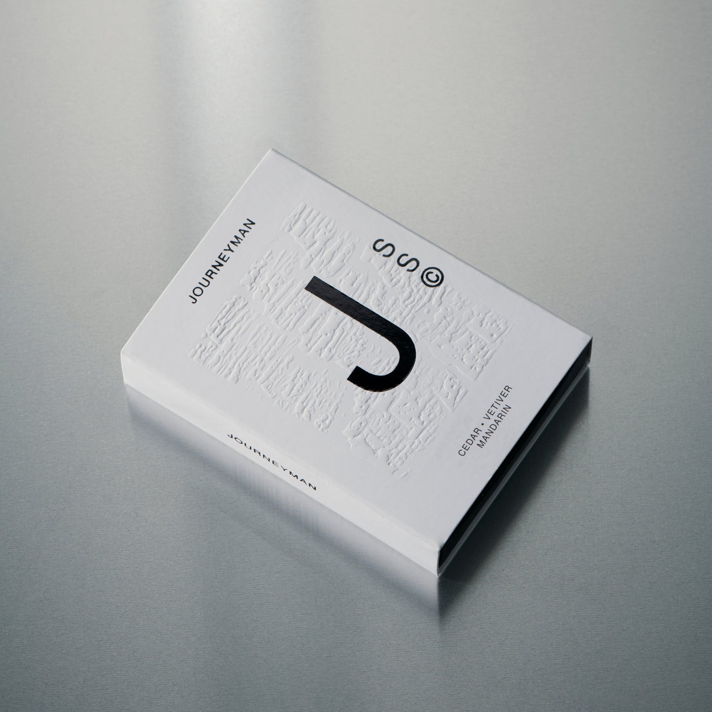 Solid State fragrance balm designed for effortless reapplication with a clean, understated finish