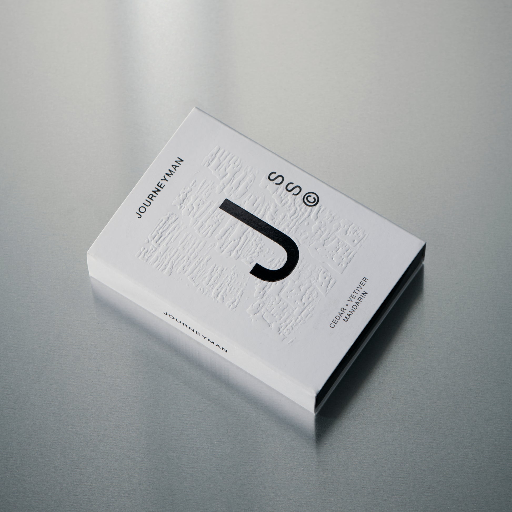 Solid State fragrance balm designed for effortless reapplication with a clean, understated finish