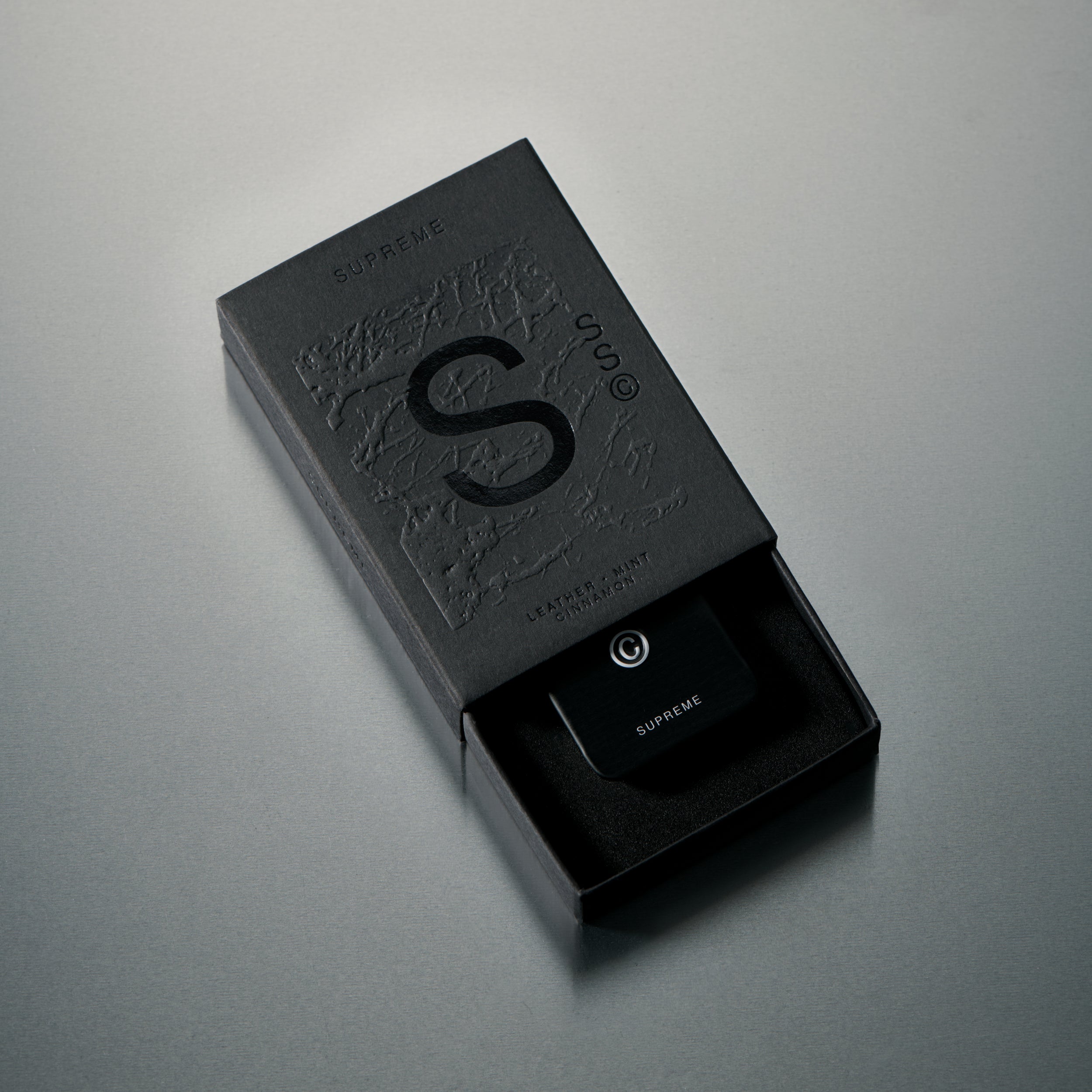 Solid State Supreme solid cologne formulated for controlled fragrance application with a smooth, wax-based texture