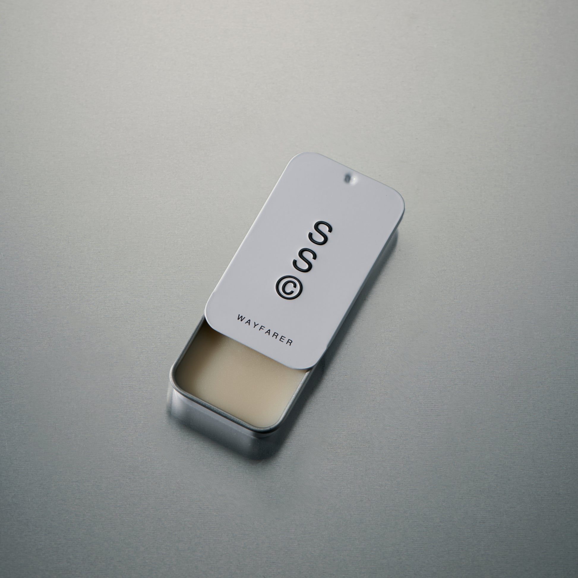 Solid State Wayfarer solid cologne delivering a fresh, versatile scent with a smooth, wearable profile