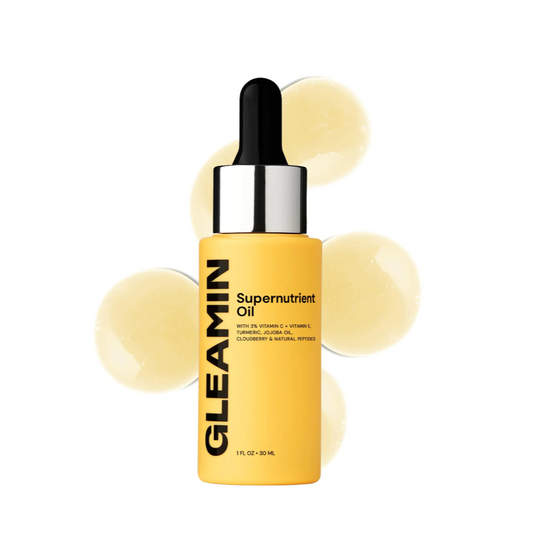Gleamin Supernutrient Oil bottle on a white background