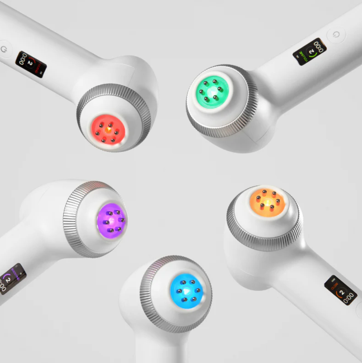 Multiple Medicube Age-R Ultra Tune 40.68 with colored lights on a light grey background.