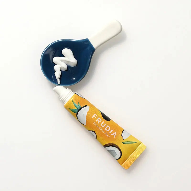 Frudia Pomegranate Honey 3 in 1 Lip Balm 10ml rich balm texture deeply hydrating and smoothing dry lips soft glossy finish