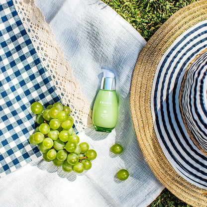 FRUDIA Green Grape Pore Control Serum 50g with glossy, hydrated texture and natural ingredients in a modern editorial layout