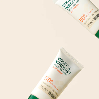 FRUDIA What’s Wrong Help Cicaderm Sun Cream 50g styled in a clean, minimal composition highlighting soothing sun protection