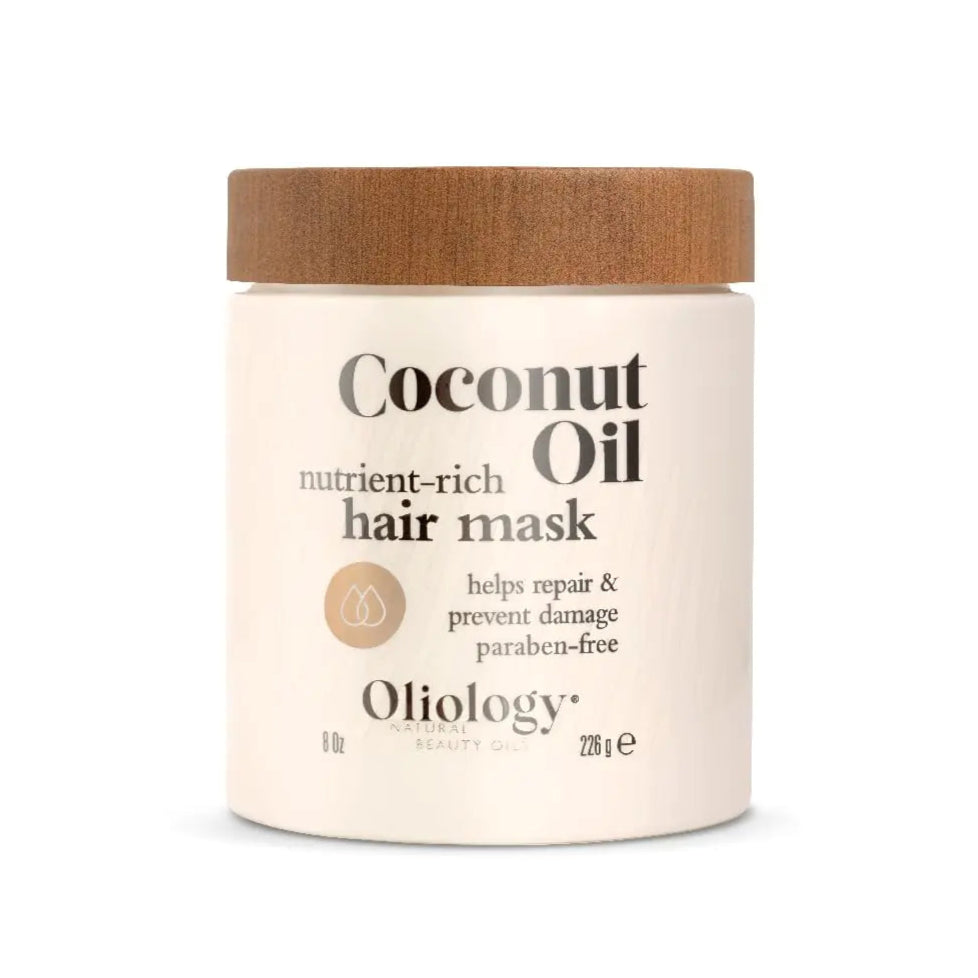 Oliology coconut oil hair mask jar with wooden lid on a white background