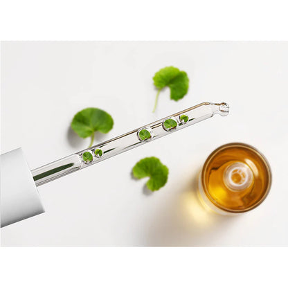 SKIN1004 Madagascar Centella Ampoule 100ml serum captured in dropper showing smooth weightless consistency
