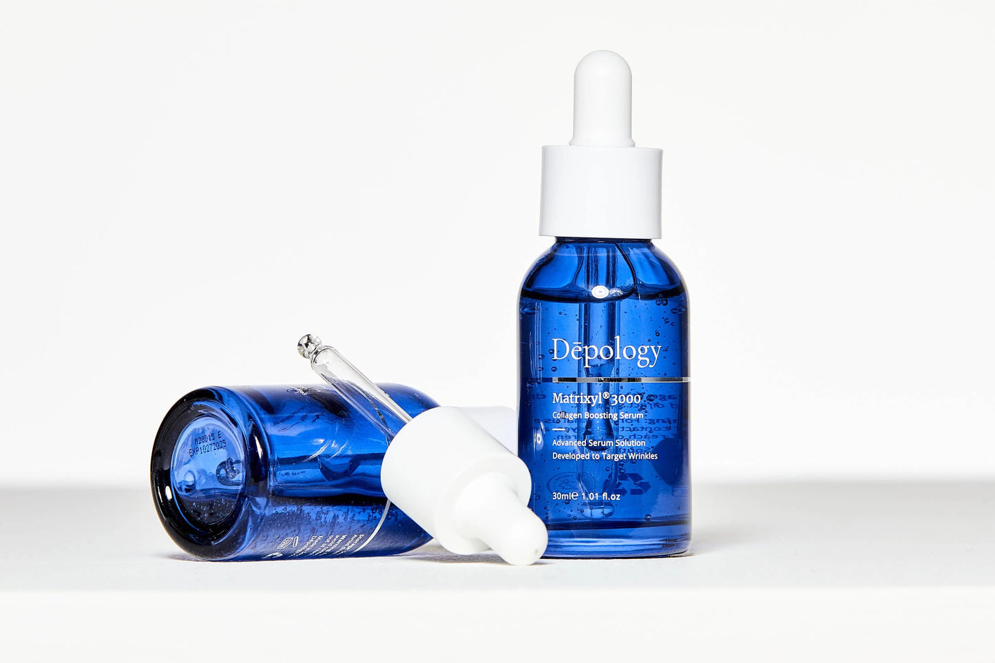 Depology Matrixyl 3000 Collagen Serum 30ml with dropper lifted from bottle revealing lightweight serum and refined formulation